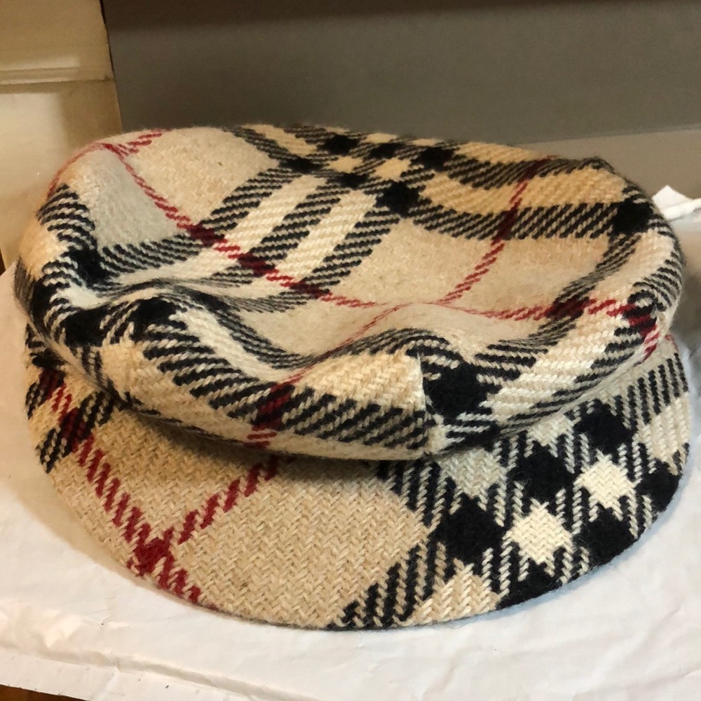 Authentic brought on Poshmark! Never WORN!